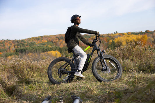 Man riding Greenworks 26" e-bike