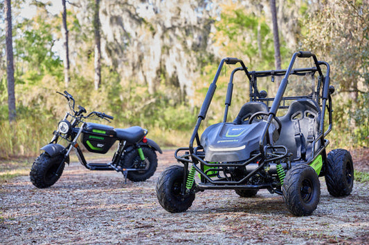 Greenworks go-kart and mini bike on a dirt path